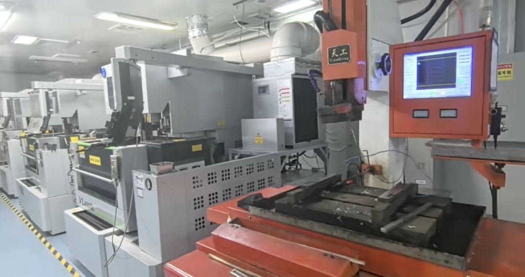 Vertical CNC machining center for packaging machinery component manufacturing